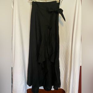 White House Black Market long black tie front skirt. Never worn, tags on.